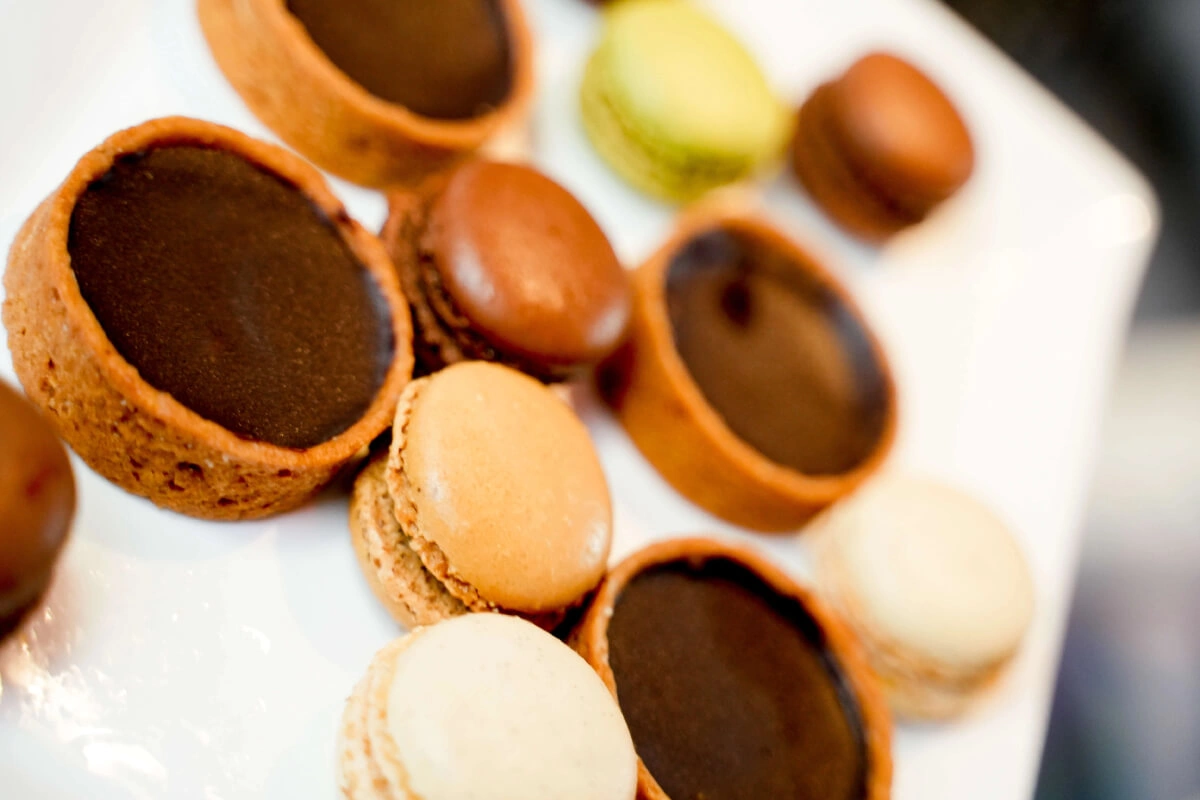 Macarons and tiny chocolate pies are served at the event in Museum of Illusions Las Vegas.